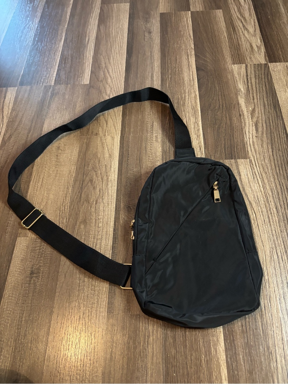 Black nylon crossbody bag with gold hardware Sling bag